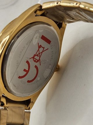 Reloj skyline acero quirúrgico chapado en oro