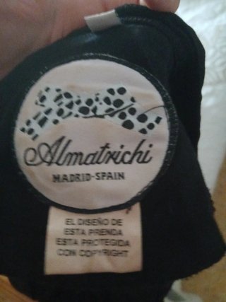 Sobrecamisa negra con transparencias y bordados