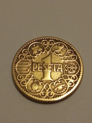 3 monedas de 1 Peseta española, acuñada en 1944.