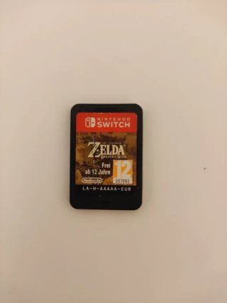 Nintendo Switch + Zelda + 4 Joy-Con