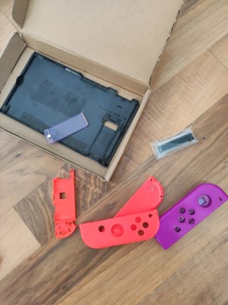 Nintendo Switch + Zelda + 4 Joy-Con