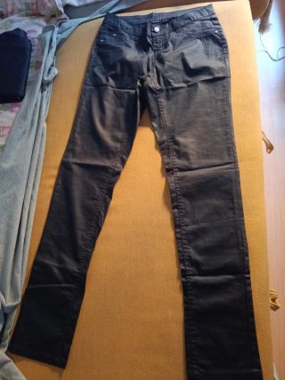 Pantalones efecto piel negros