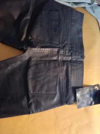 Pantalones campana efecto piel