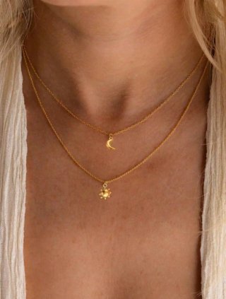 Elegante collar doble capa sol y luna
