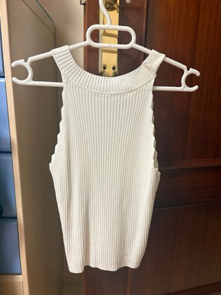 Top blanco de punto sin mangas Da hasta una M