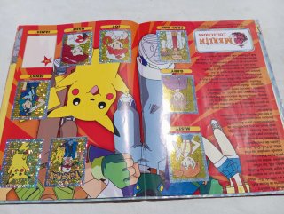 Álbum Pokémon Merlin 1999 póster original retro