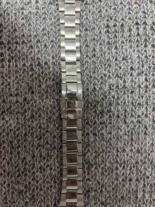 Reloj Plateado Bisel Azul