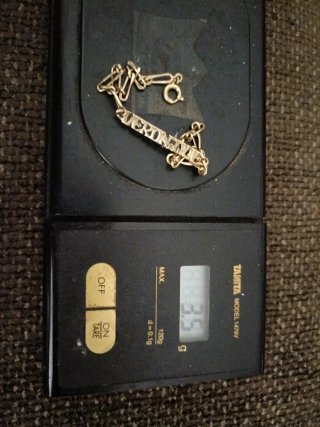 Pulsera de oro bajo con eslabones