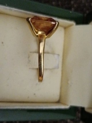 Anillo compromiso   piedra naranja y oro