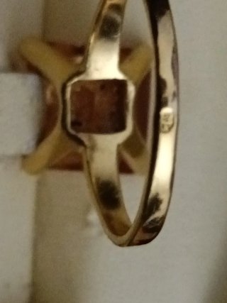 Anillo compromiso   piedra naranja y oro