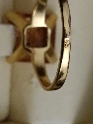 Anillo compromiso   piedra naranja y oro