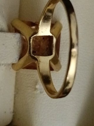 Anillo compromiso   piedra naranja y oro