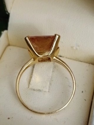 Anillo compromiso   piedra naranja y oro
