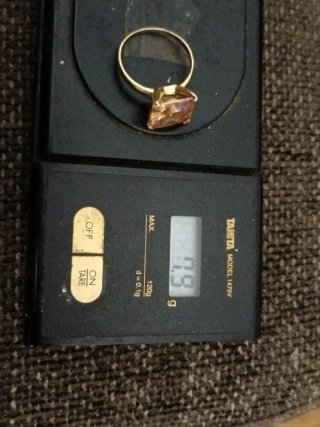 Anillo compromiso   piedra naranja y oro