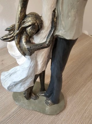 Escultura familiar 4 miembros