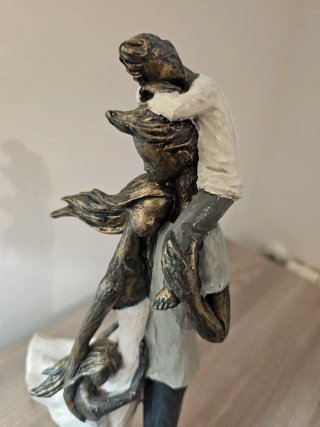 Escultura familiar 4 miembros