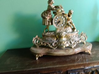Reloj de sobremesa bronce figuras