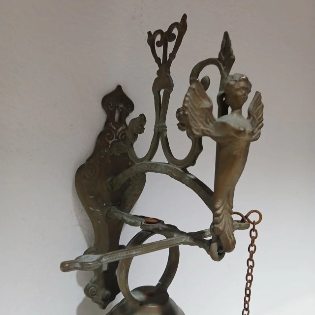 Timbre antiguo de latón con ángel