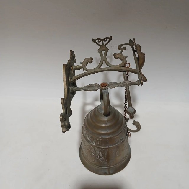 Timbre antiguo de latón con ángel