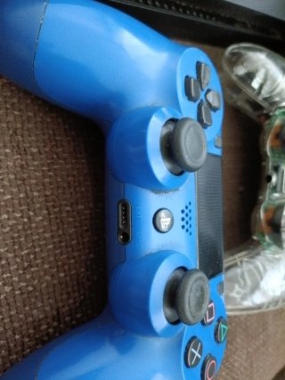 PS4 Slim + 5 Juegos + 2 Mandos