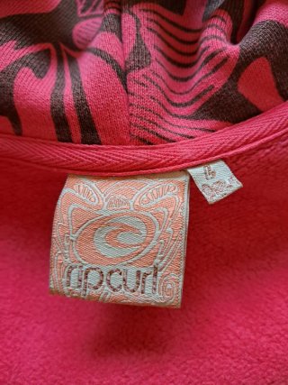 Chaqueta surfera Rip Curl rosa y marrón