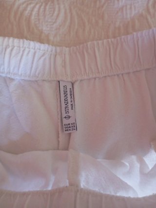 Pantalón lino blanco Stradivarius