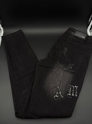 Jeans Uomo Neri Strappati