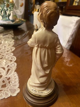 Statua angioletto con candela Merli
