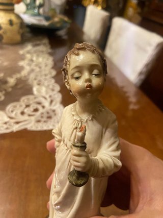 Statua angioletto con candela Merli