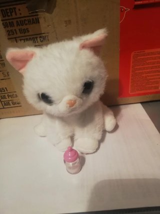 Gatito blanco de peluche con sonido