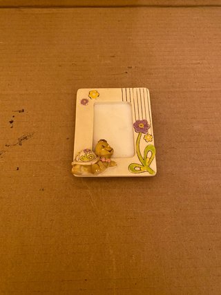 Cornice portafoto bimbo tartaruga fiori