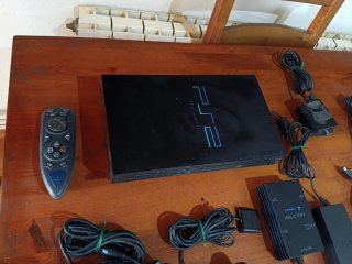 PS2 Fat + 4 mandos + juego+conector camara
