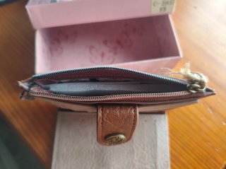 Cartera de piel con estampado
