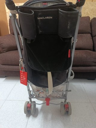 Cochecito Maclaren con funda impermeable