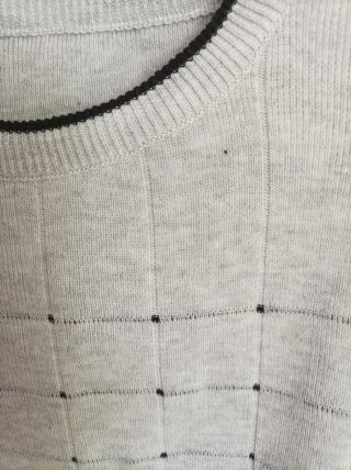 Jersey gris de punto con detalles