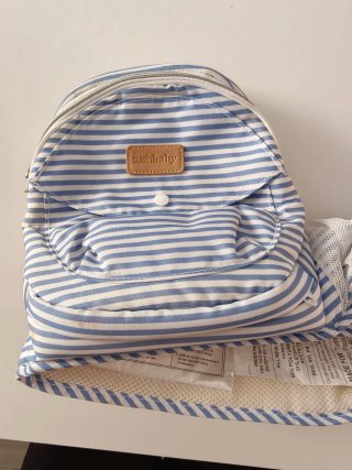 Portabebés Tushbaby a rayas azules