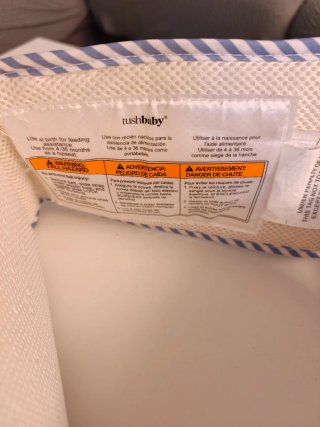 Portabebés Tushbaby a rayas azules
