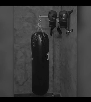 Saco de boxeo con soporte de pared