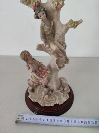 Figura vintage recolectores de frutas