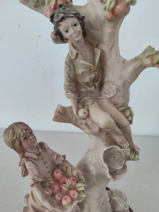 Figura vintage recolectores de frutas