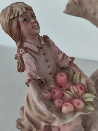 Figura vintage recolectores de frutas