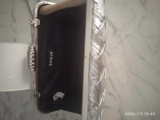 Bolso de fiesta plateado tejido