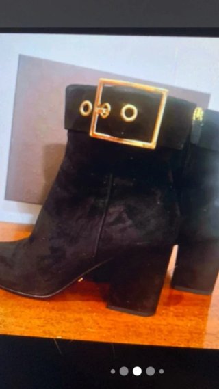 Stivaletti Gucci neri con fibbia