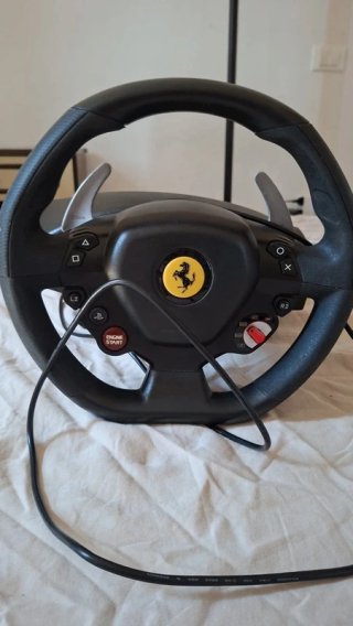 Pack PS5 Slim + Volante Ferrari + 5 Juegos