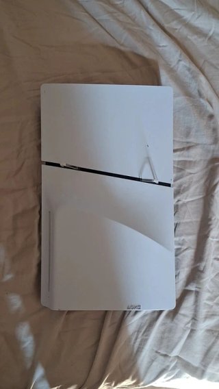 Pack PS5 Slim + Volante Ferrari + 5 Juegos