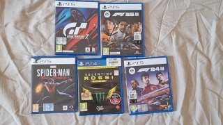Pack PS5 Slim + Volante Ferrari + 5 Juegos