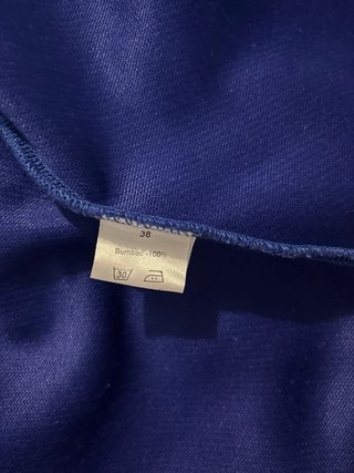 Chaqueta azul con cinturón