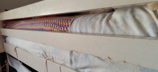 Cama alta con tobogán