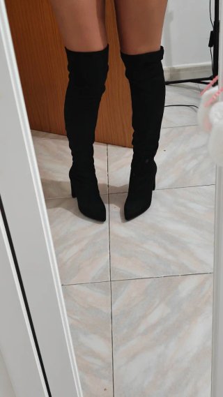 Botas altas negras de tacón
