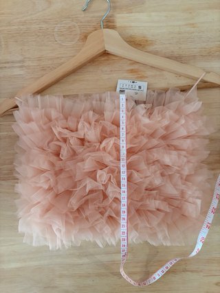Top rosa de tul con volantes texturizados